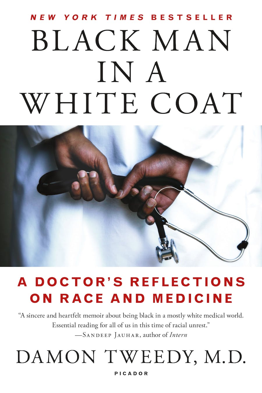 A white cover with a photo of a black physician's hands holding a stethoscope.