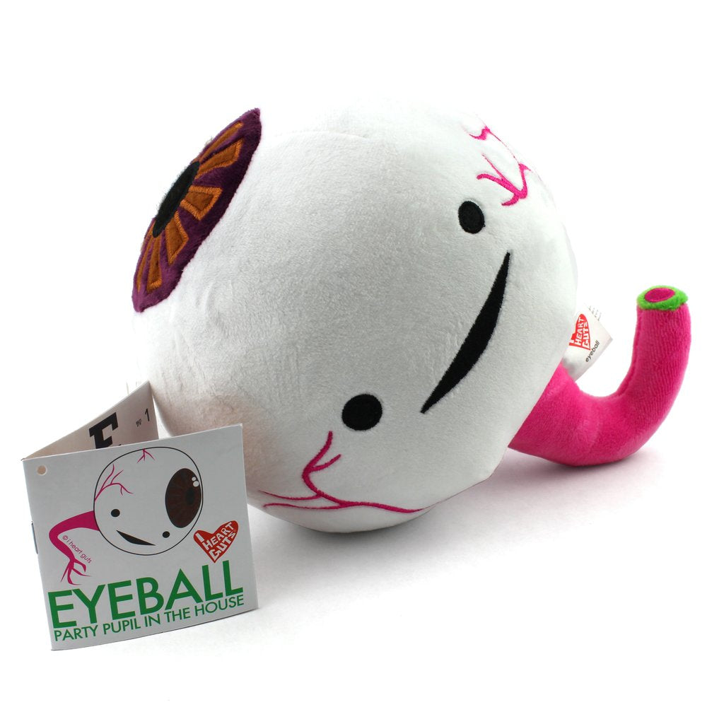 A white plush of an eyeball with two eyes and a smile. There are pink veins and a brown pupil.