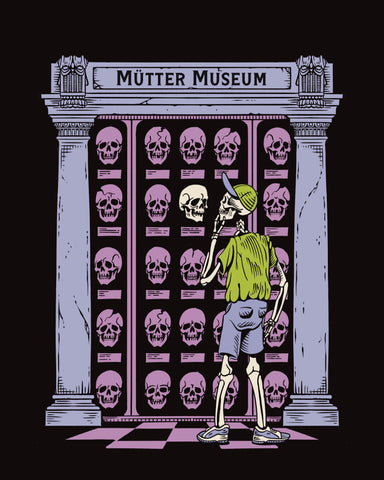 A black t-shirt with the columns of the museum building depicted in a blue grey. There is an illustration of a skeleton in a green shirt and baseball hat, staring at the wall of Hyrtl skulls which are purple. One of the skulls is white and facing the skeleton .