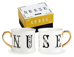 A white porcelain mug with a gold handle and the word "NURSE" written across it in a unique, heavily serif-ed font.