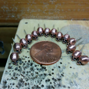 Pink Bronze Skull Stud Earrings