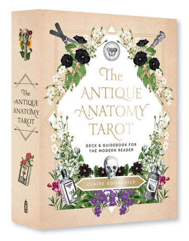 A beige box with colorful flowers and black and white medical tools, skeletons, and bottles.