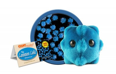 A blue plush with two large black eyes in the shape of a common cold cell.